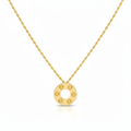 Gold necklace with a circular pendant on a white background