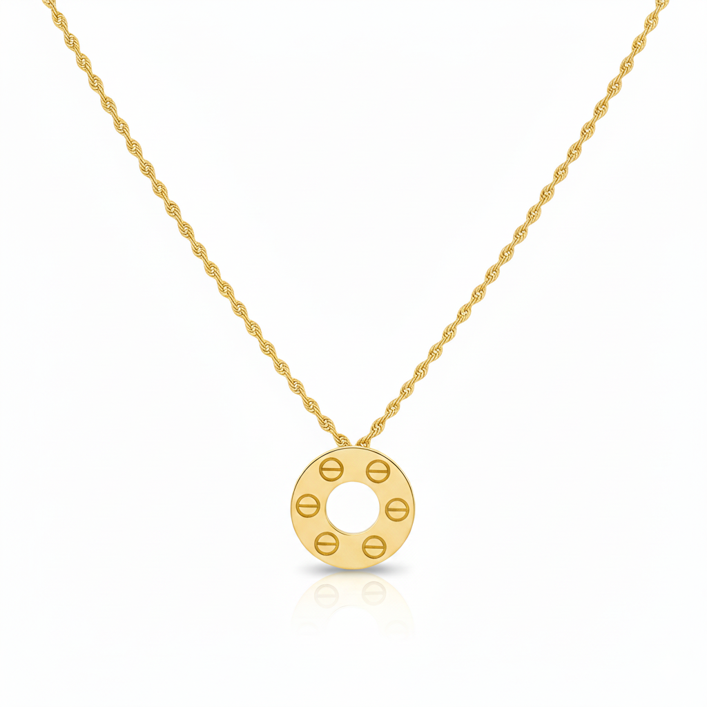 Gold necklace with a circular pendant on a white background