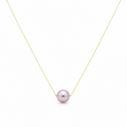 Necklace with a single pink pearl on a white background
