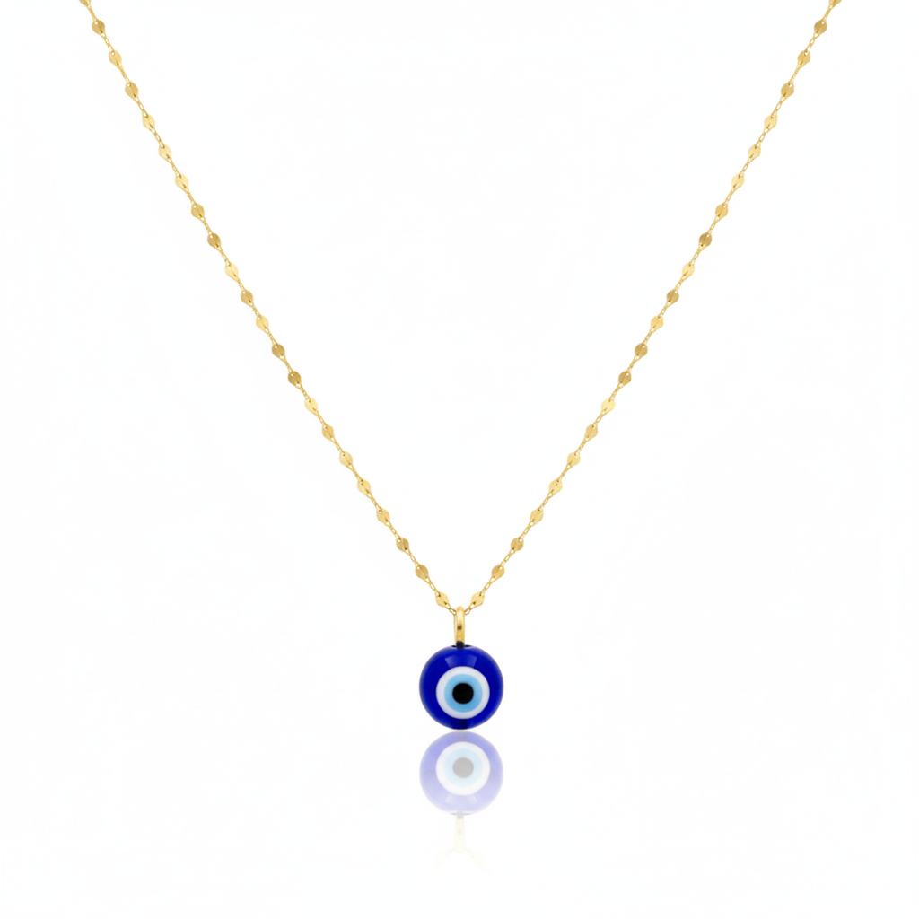 Gold necklace with a blue evil eye pendant on a white background