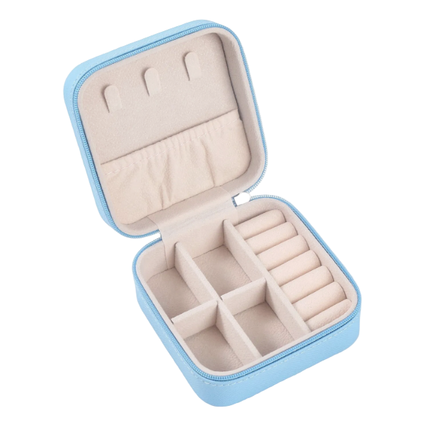 Open jewelry case with compartments on a light gray background