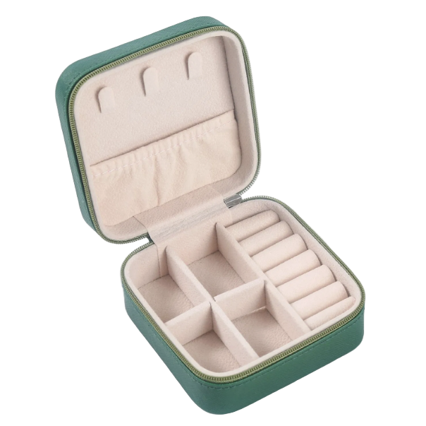 Green jewelry case with beige interior on a white background