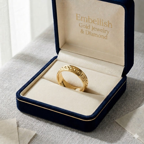 Gold necklace in an open jewelry box with 'Embellish Gold Jewelry & Diamond' branding.