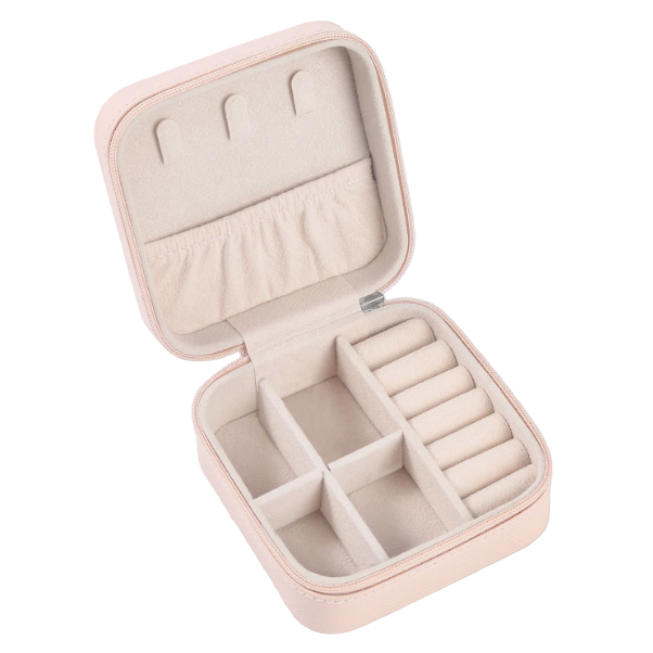 Pink jewelry case with compartments on a white background