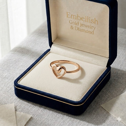 Gold ring in a jewelry box with 'Embellish Gold Jewelry & Diamond' branding.