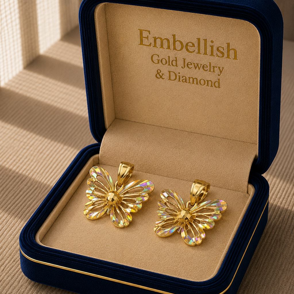 Gold butterfly earrings in a 'Embellish Gold Jewelry & Diamond' box.