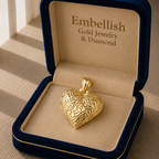 Gold heart-shaped pendant in a 'Embellish Gold Jewelry & Diamond' box.