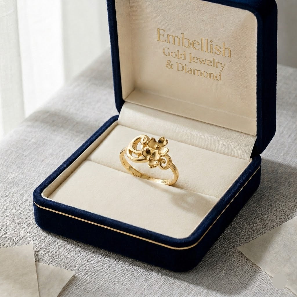 Gold ring in a jewelry box with 'Embellish Gold Jewelry & Diamond' branding.