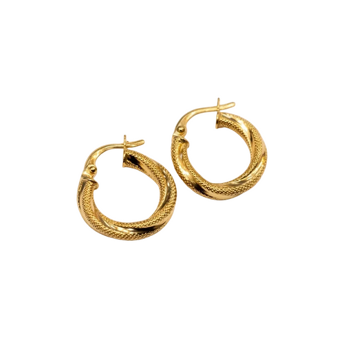 Gold hoop earrings on a white background