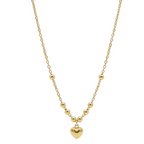 Two gold necklaces on a light gray background