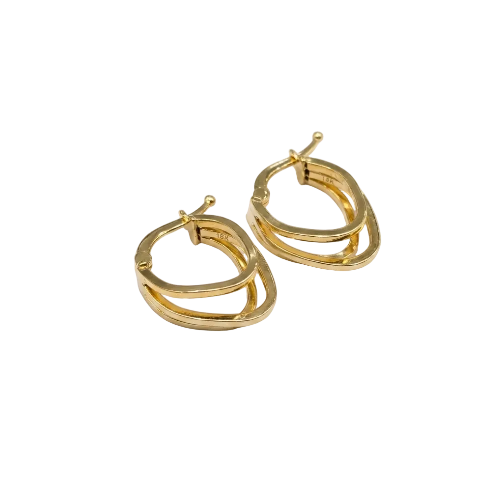 Pair of gold hoop earrings on a light gray background