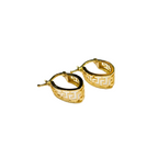 Gold hoop earrings with intricate design on a white background