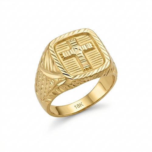 Gold ring with cross design on a white background