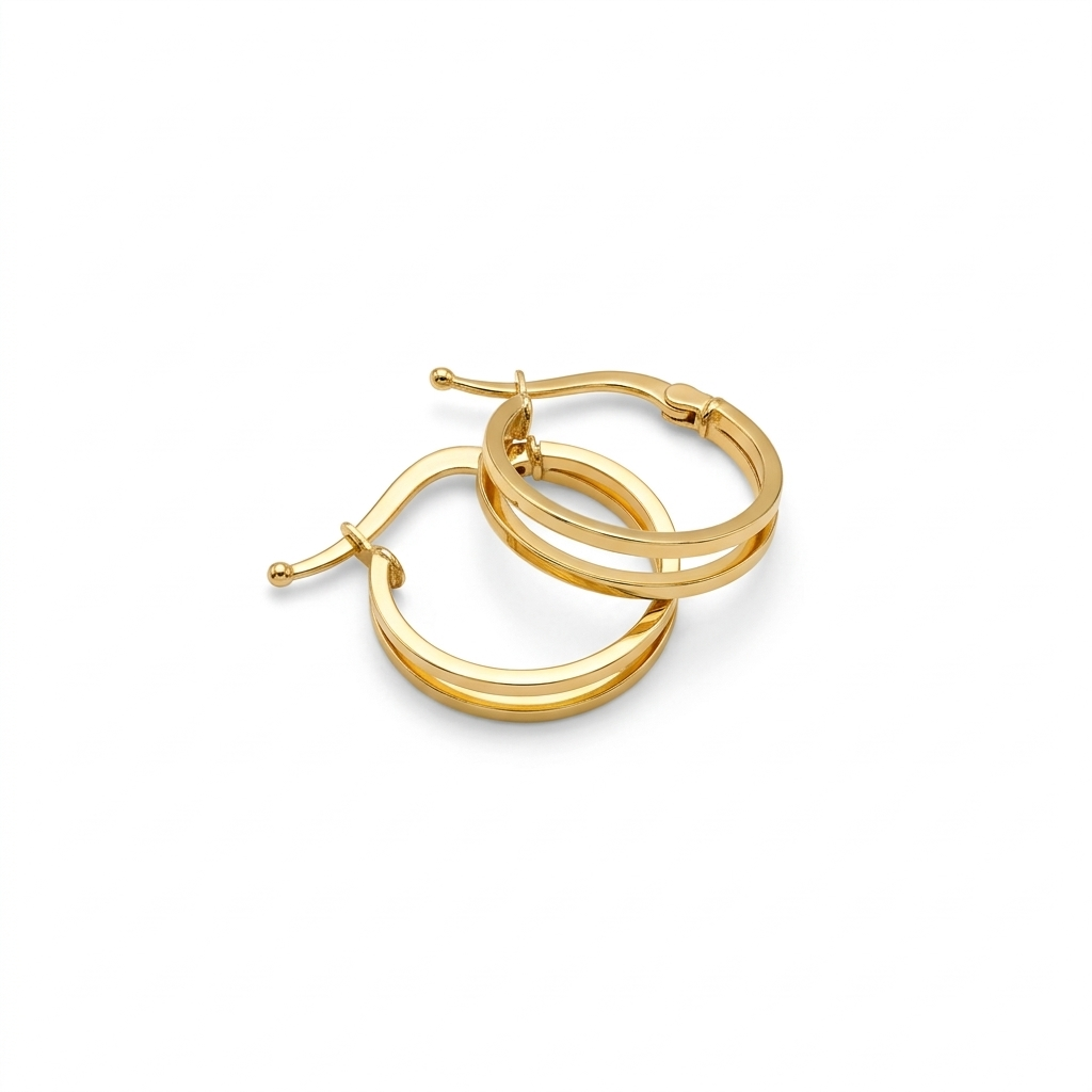 Gold hoop earrings on a white background