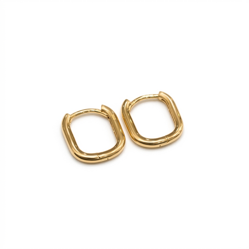 Gold hoop earrings on a white background