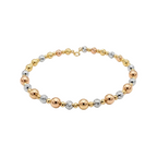 Three-tone gold, silver, and rose gold beaded bracelet on a white background