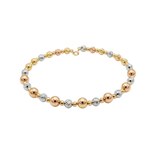 Three-tone gold, silver, and rose gold beaded bracelet on a white background