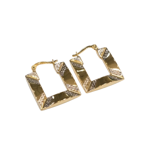 Gold hoop earrings on a light gray background