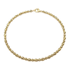 Gold chain bracelet on a white background