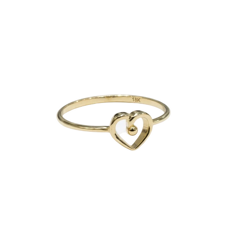 Gold heart-shaped ring on a white background