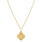 Gold necklace with a clover-shaped pendant on a white background