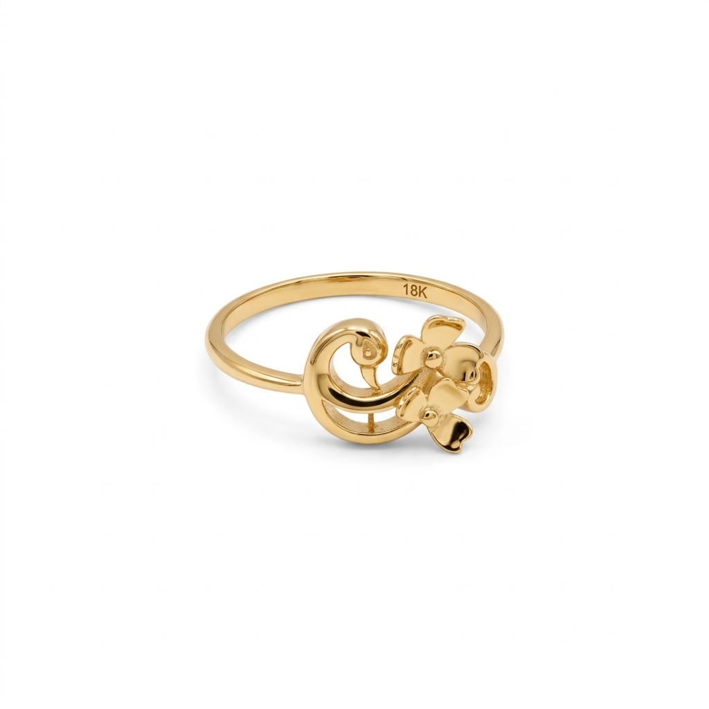 Gold ring with a monkey design on a white background