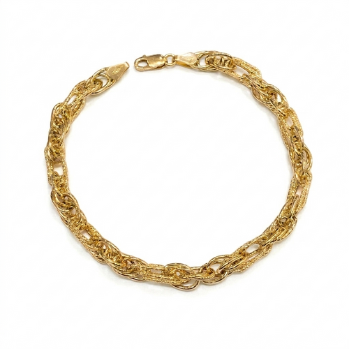 Gold chain bracelet on a white background