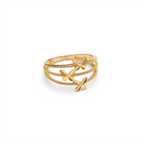 Gold ring with floral designs on a white background