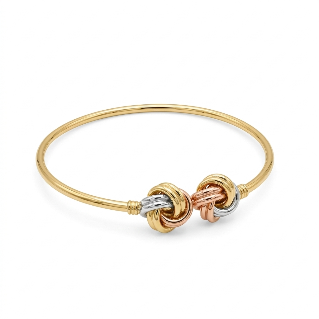 Gold bracelet with interlocking rings on a white background