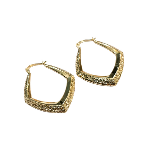 Gold hoop earrings on a white background