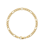 Gold chain bracelet on a light gray background
