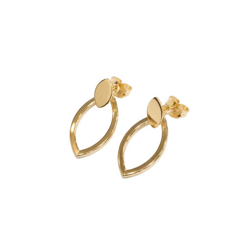 Gold hoop earrings on a light gray background