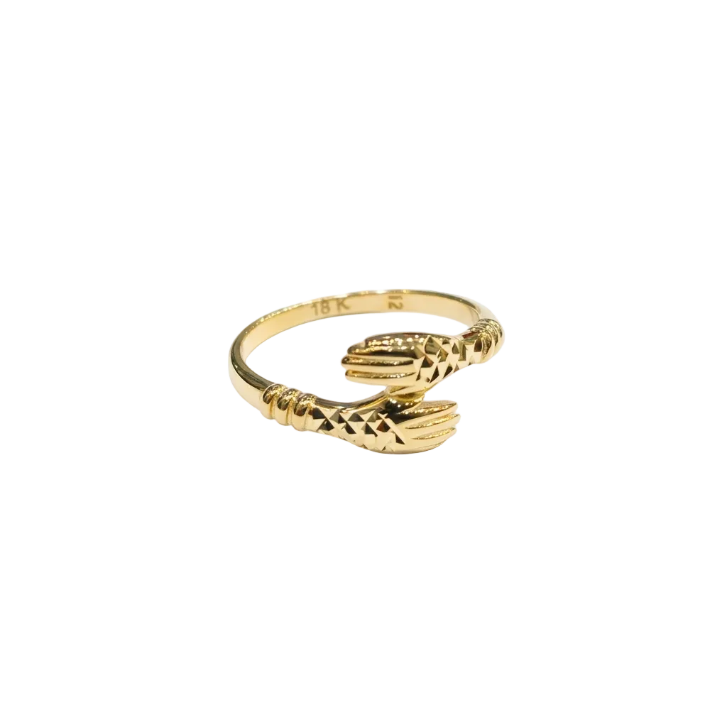Gold ring with a unique design on a white background