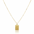 Gold necklace with a rectangular pendant on a white background