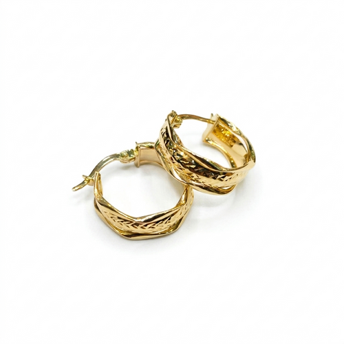 Gold hoop earrings on a white background