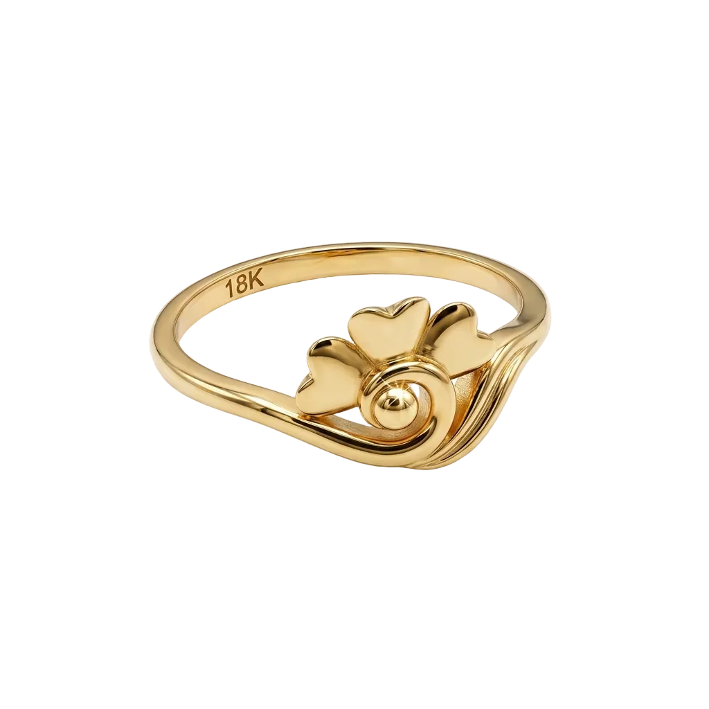 Gold ring with a heart design on a white background