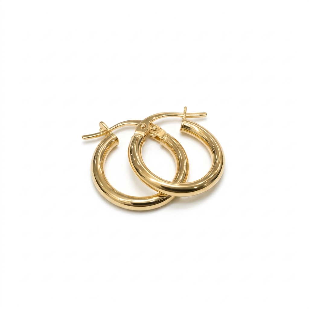 Pair of gold hoop earrings on a white background