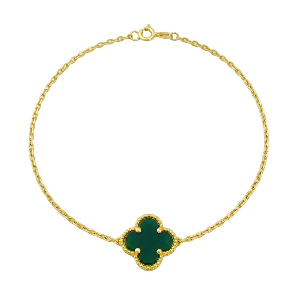 Gold bracelet with a green clover-shaped clasp on a white background