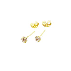 Gold stud earrings with round diamond settings on white background