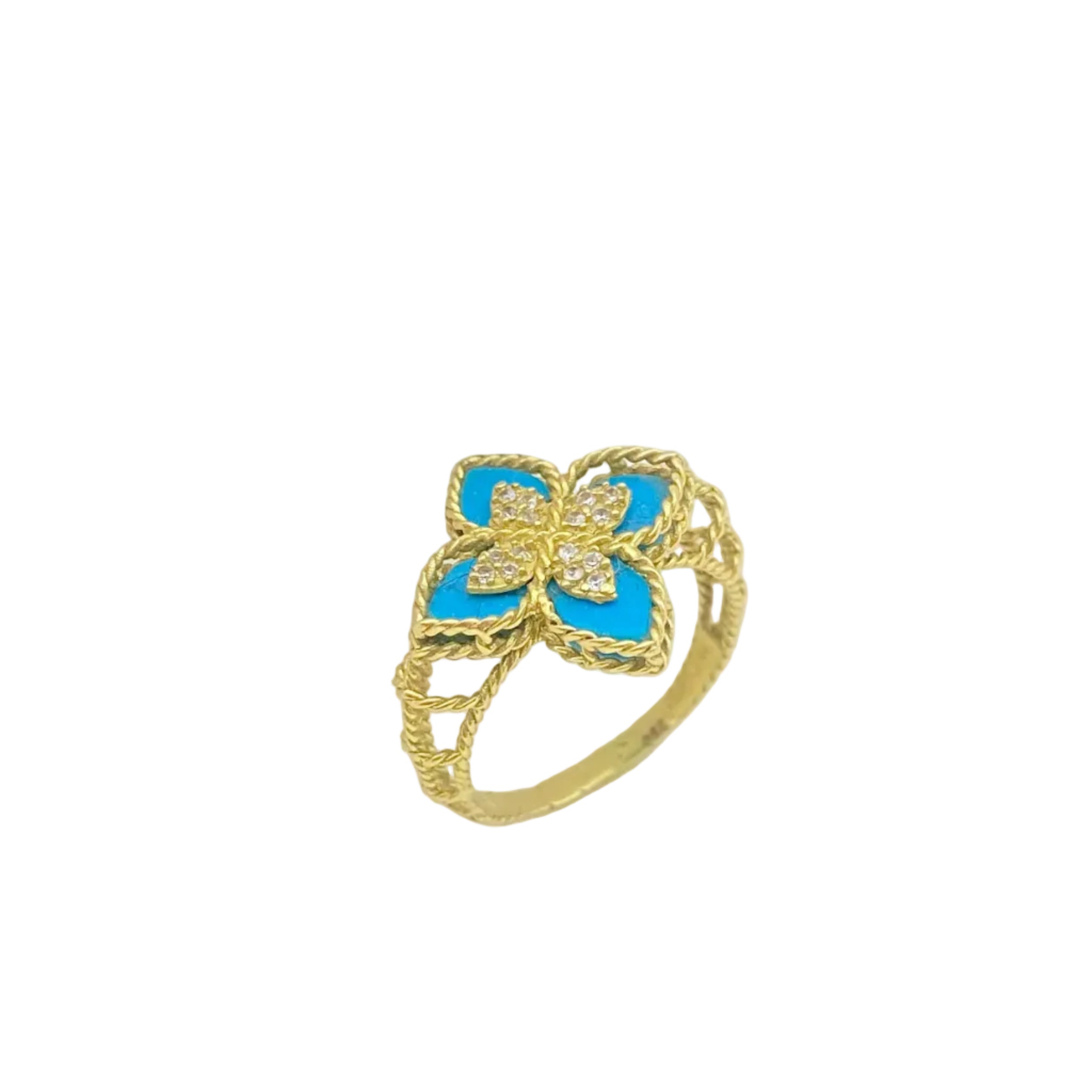 Gold ring with a blue flower design on a white background