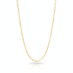 Gold chain necklace on a white background