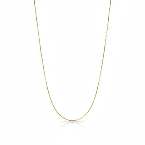 Gold chain necklace on a white background