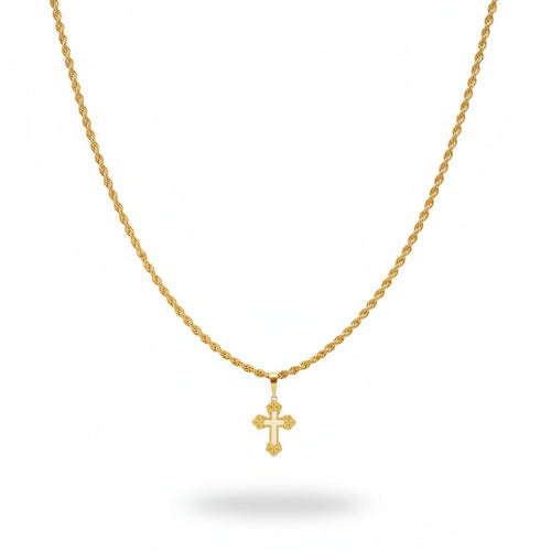 Gold necklace with cross pendant on a black velvet stand