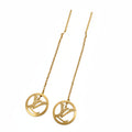 Gold necklace with circular pendants on a white background