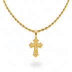 Gold necklace with a cross pendant on a black bust against a beige background