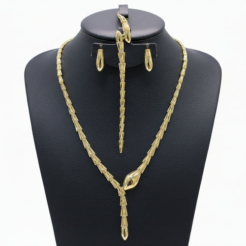 Gold necklace, bracelet, earrings, and ring set on a black mannequin with weight details.