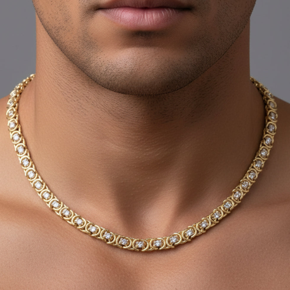 Gold necklace with diamonds on a person's neck against a blurred background