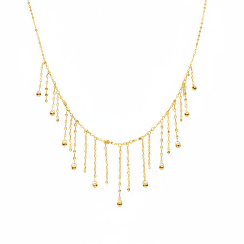 Delicate gold necklace on a mannequin with weight and code information.