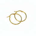 Gold hoop earrings on a light gray background with weight and code information.