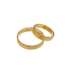 Two gold rings on a light gray background with weight information displayed.